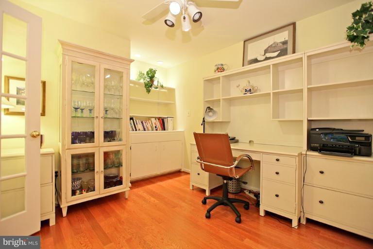 1521 Church Hill Place, Unit 1521 Reston, VA 20194 - Photo 5 of 20 a view of a workspace with furniture and a window