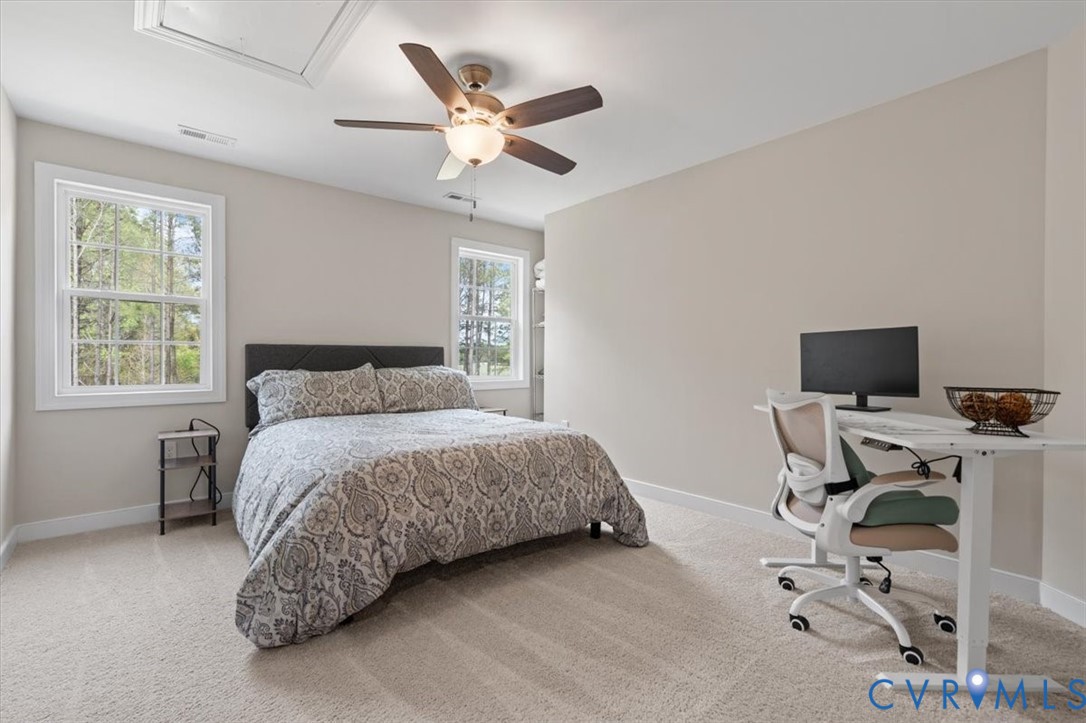 1290 Scotts Court Carson, VA 23830 - Photo 30 of 46 a bedroom with a bed and a window