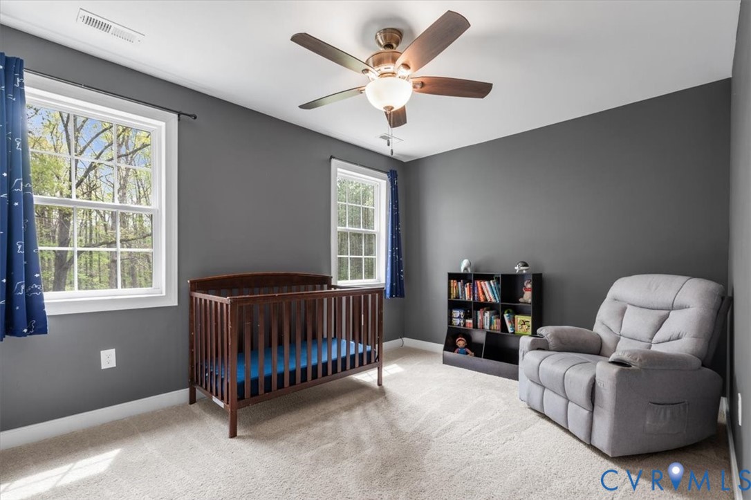 1290 Scotts Court Carson, VA 23830 - Photo 32 of 46 a living room with furniture and a window
