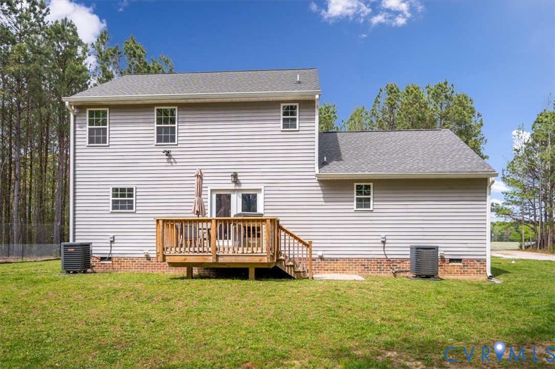 1290 Scotts Court Carson, VA 23830 - Photo 39 of 46 a view of a house with a yard