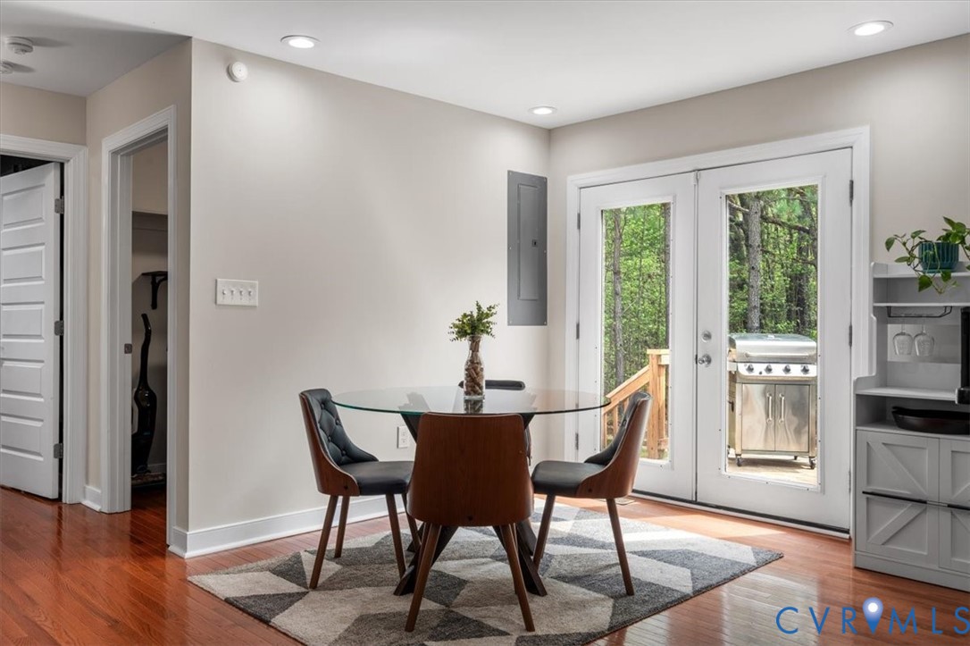 1290 Scotts Court Carson, VA 23830 - Photo 10 of 46 a view of a dining room with furniture window and wooden floor