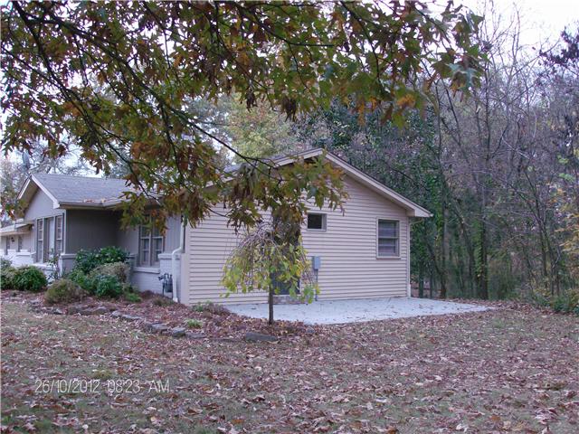 705 Baker Road Smyrna, TN 37167 - Photo 3 of 20 Even new concrete on side patio which is accessed from the den.