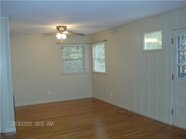 705 Baker Road Smyrna, TN 37167 - Photo 10 of 20 Partial view of large den. Original hardwood floors in here.