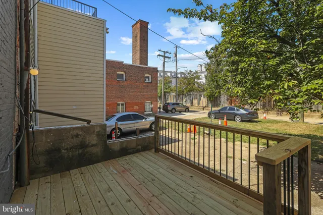 a view of a balcony with furniture