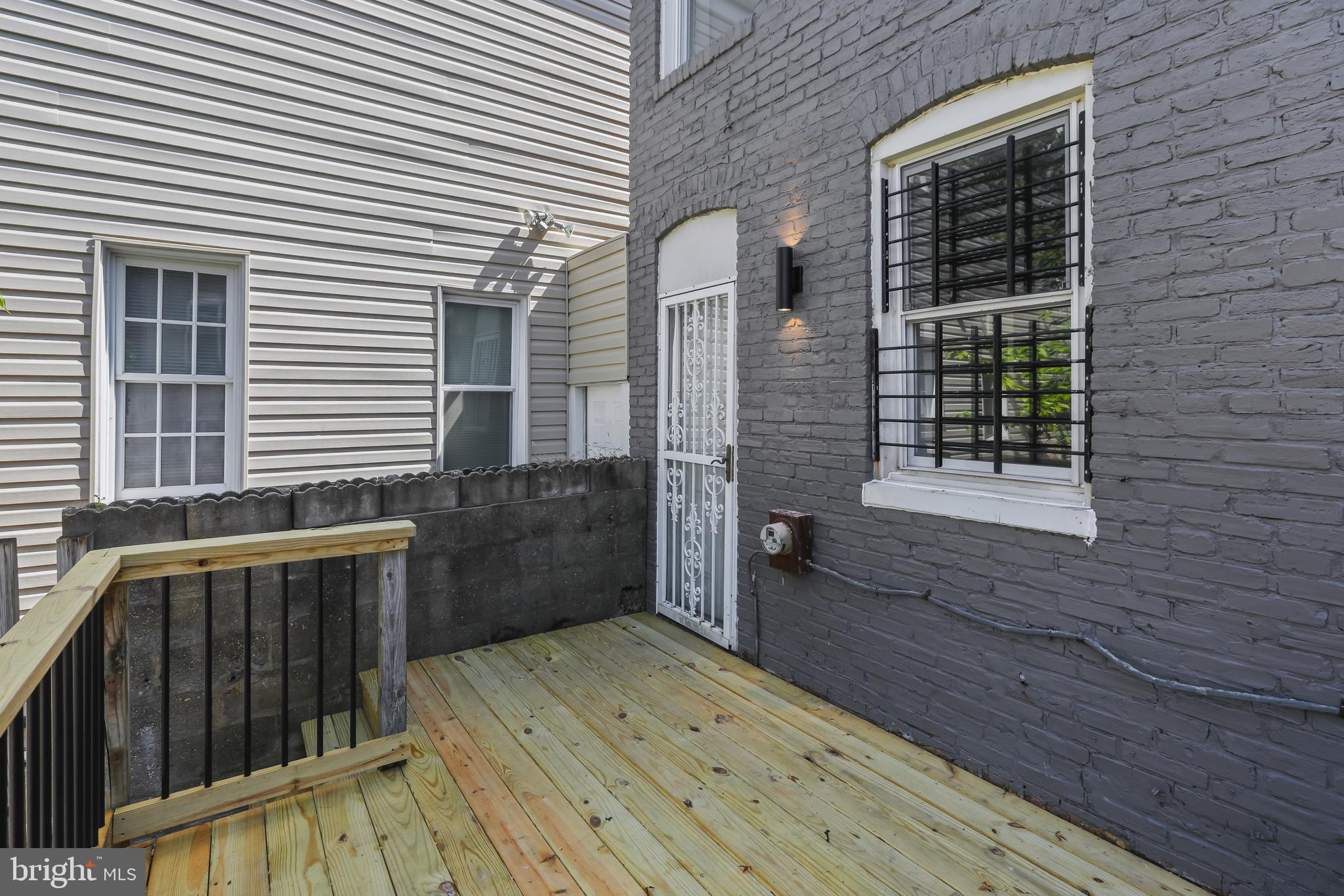 884 Washington Boulevard Baltimore, MD 21230 - Photo 33 of 35 a view of house with deck and outdoor seating