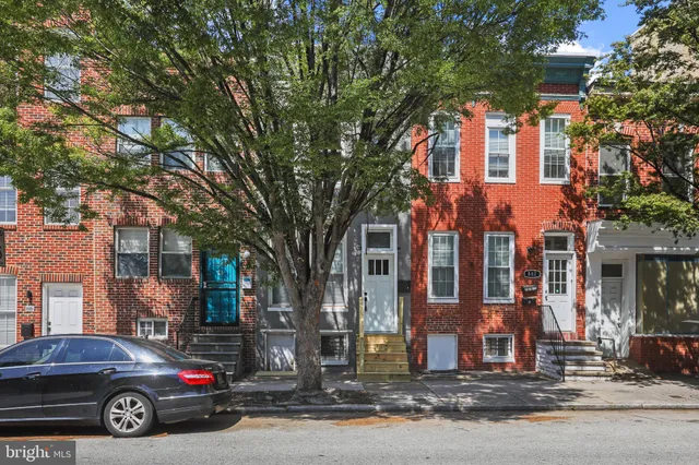 a car parked in front of a building
