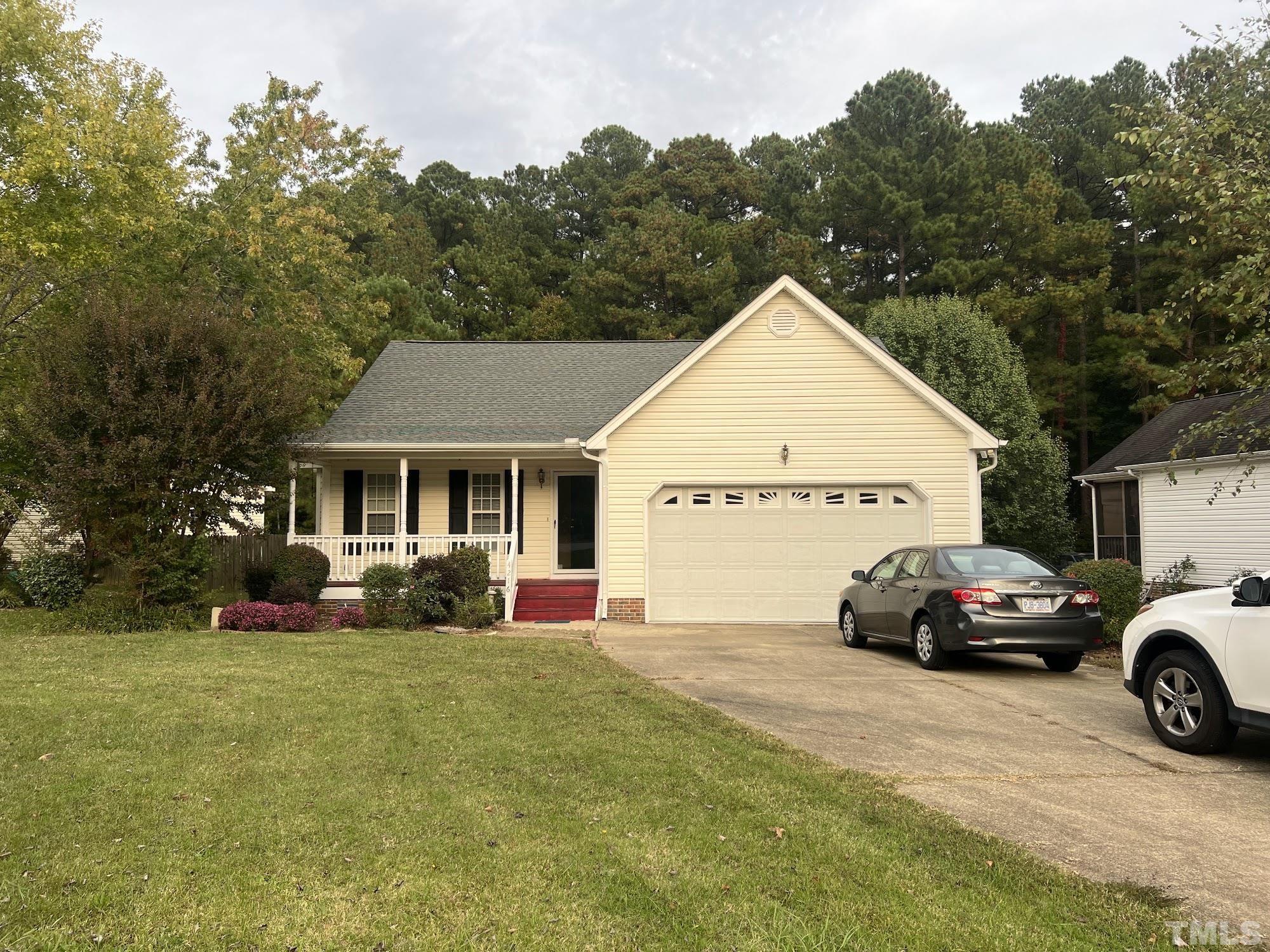 a view of a car in front of house