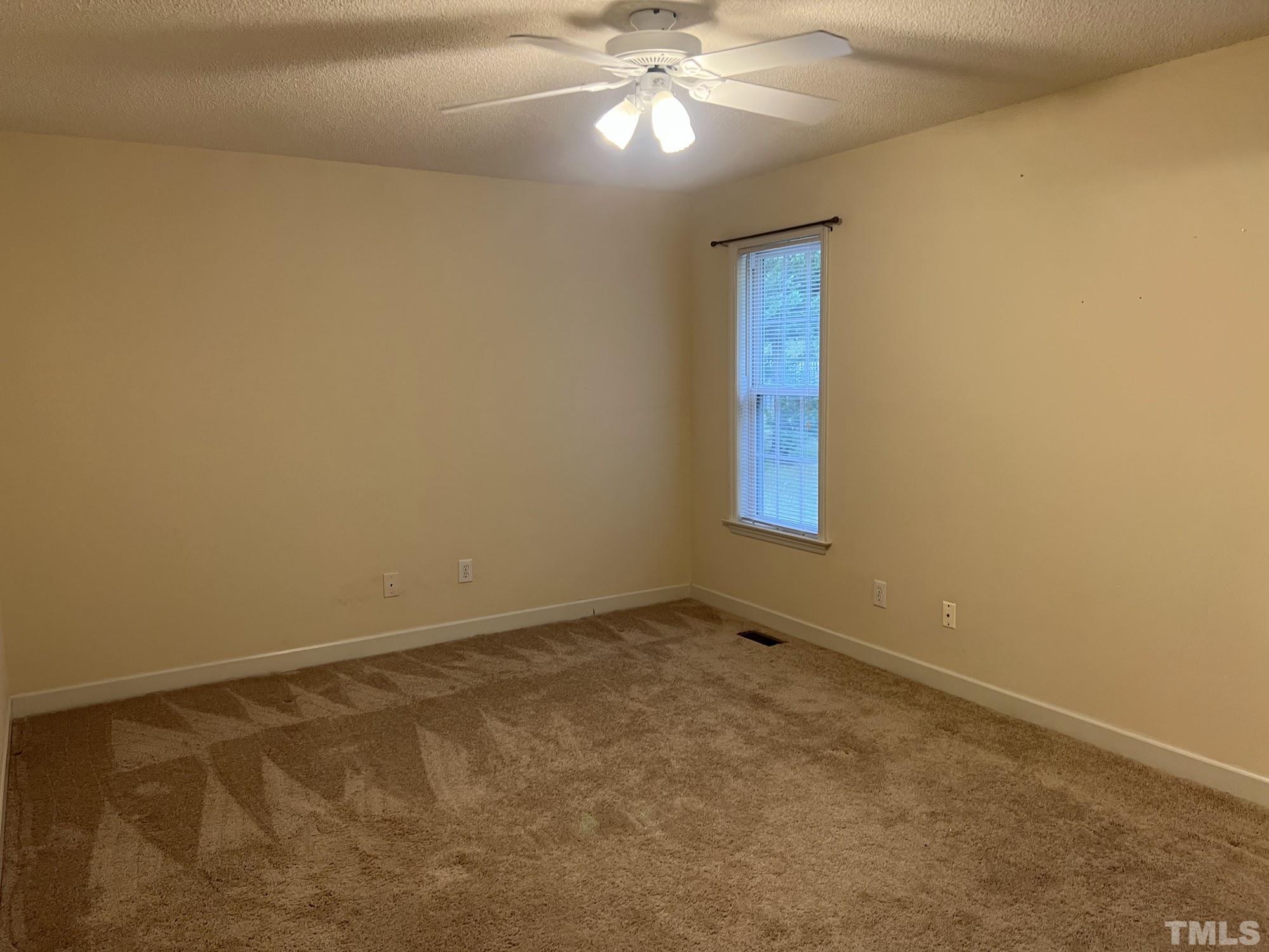 4216 Wolftrap Road Raleigh, NC 27616 - Photo 14 of 22 a view of an empty room