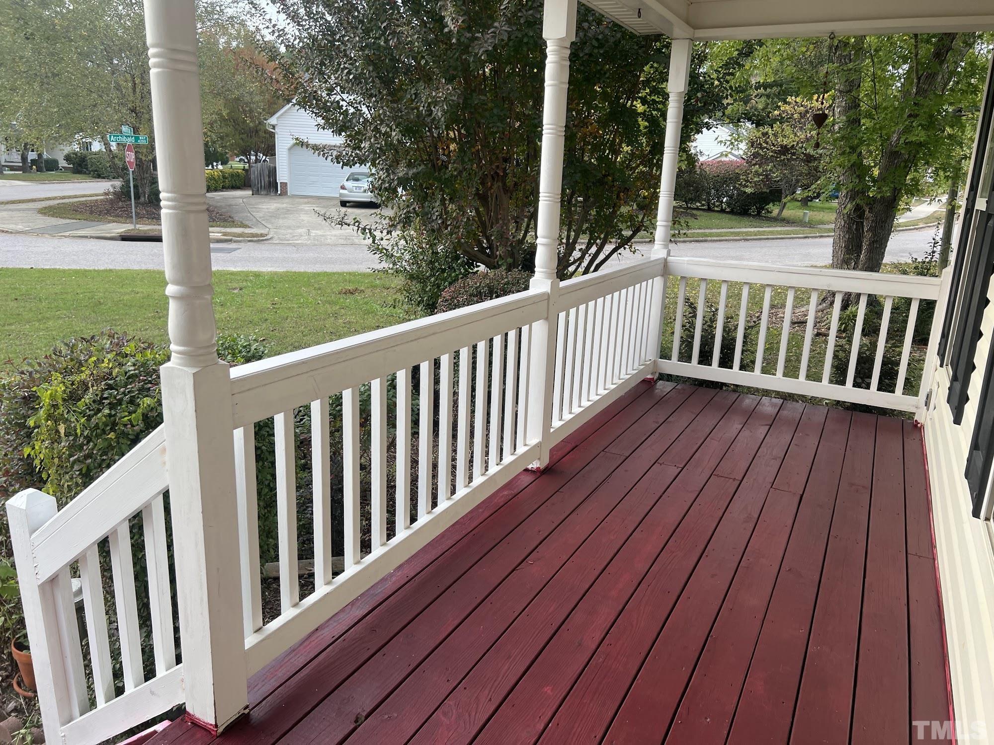 4216 Wolftrap Road Raleigh, NC 27616 - Photo 3 of 22 a view of balcony with wooden floor