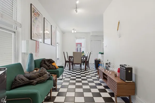 a room with furniture and a rug