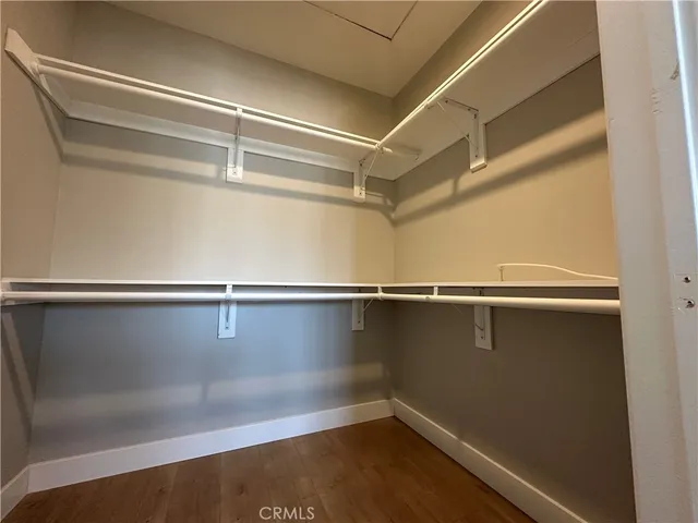 a view of a livingroom with wooden floor