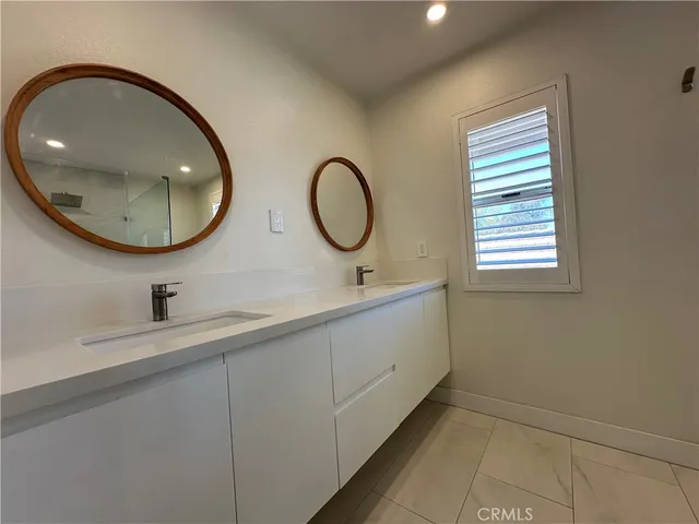 a bathroom with a shower and toilet