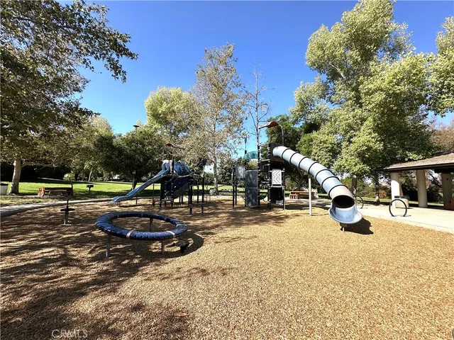 a view of a garden with patio