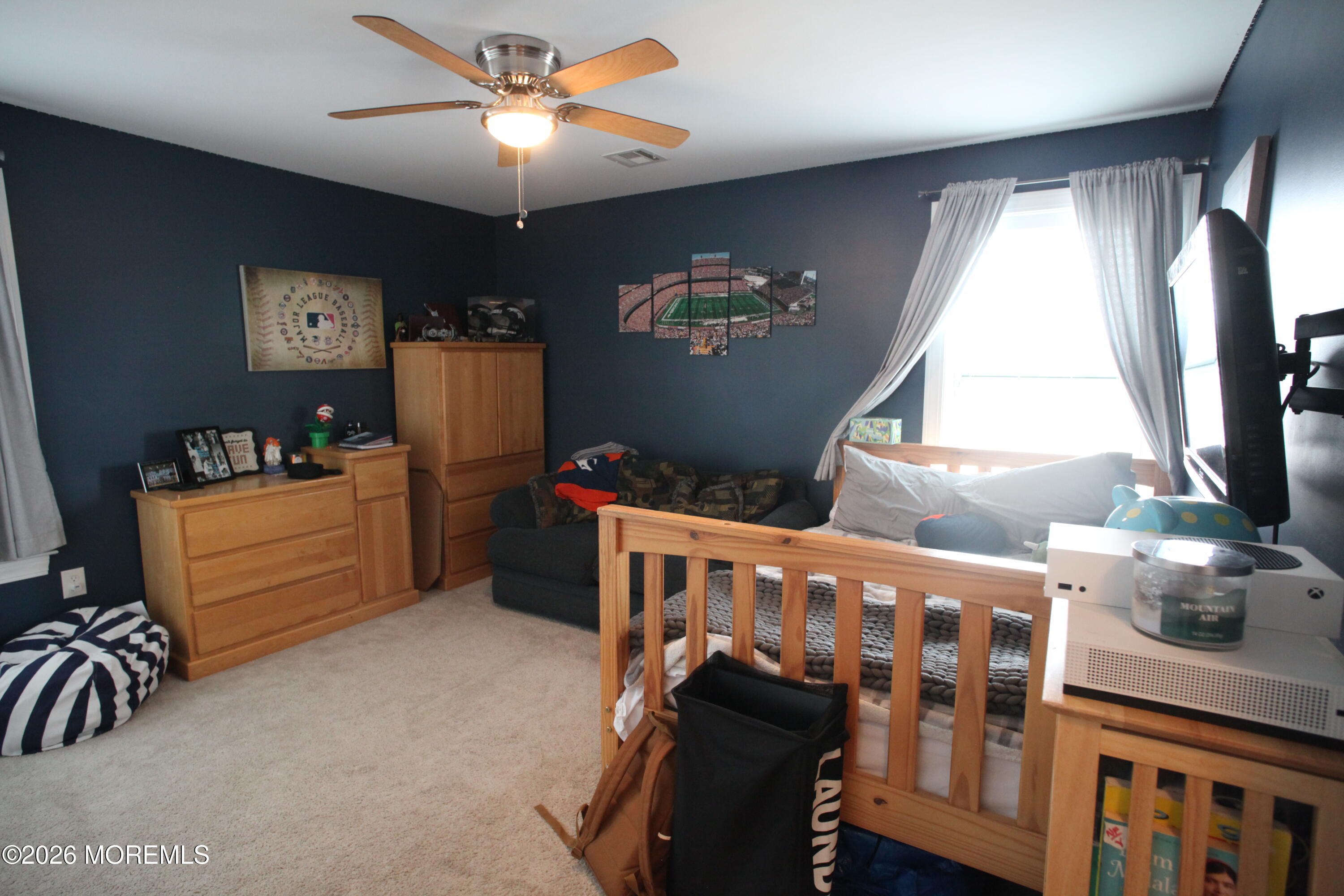 107 Waldron Road Toms River, NJ 08753 - Photo 8 of 20 a bedroom with furniture and a window