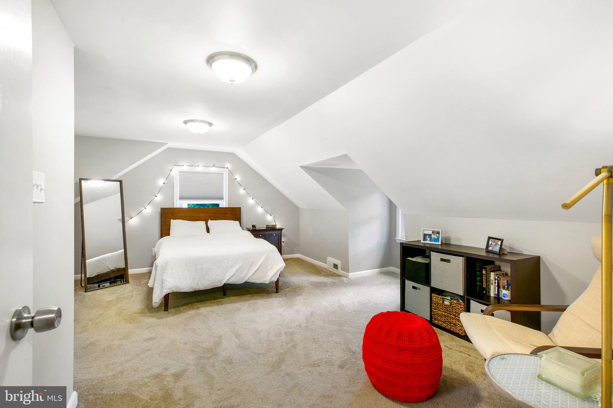 2930 Ridge Road Baltimore, MD 21244 - Photo 25 of 39 a bedroom with a bed and window