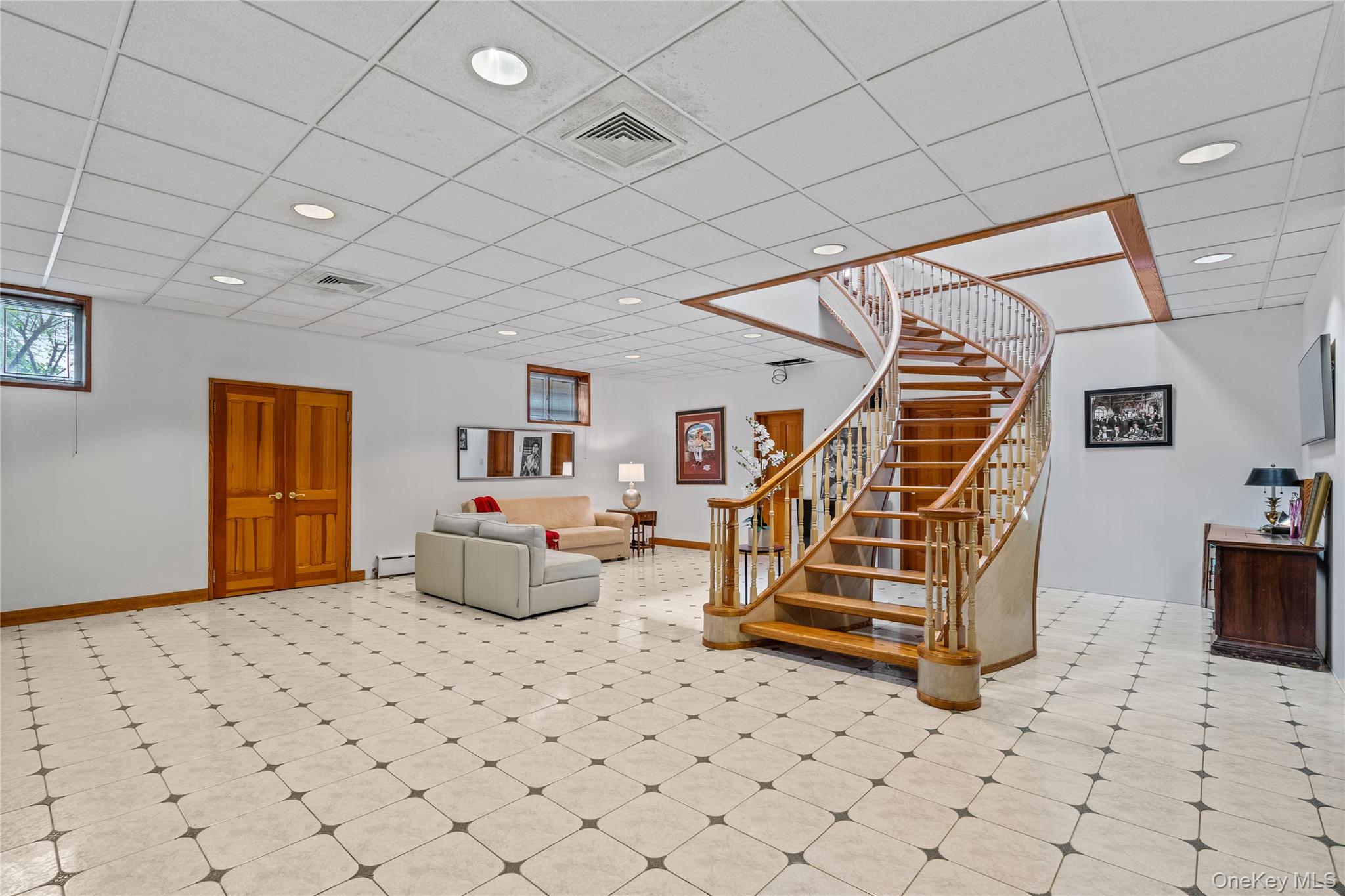 6 Summit Place Queens, NY 11357 - Photo 22 of 35 a bedroom with furniture and wooden floor