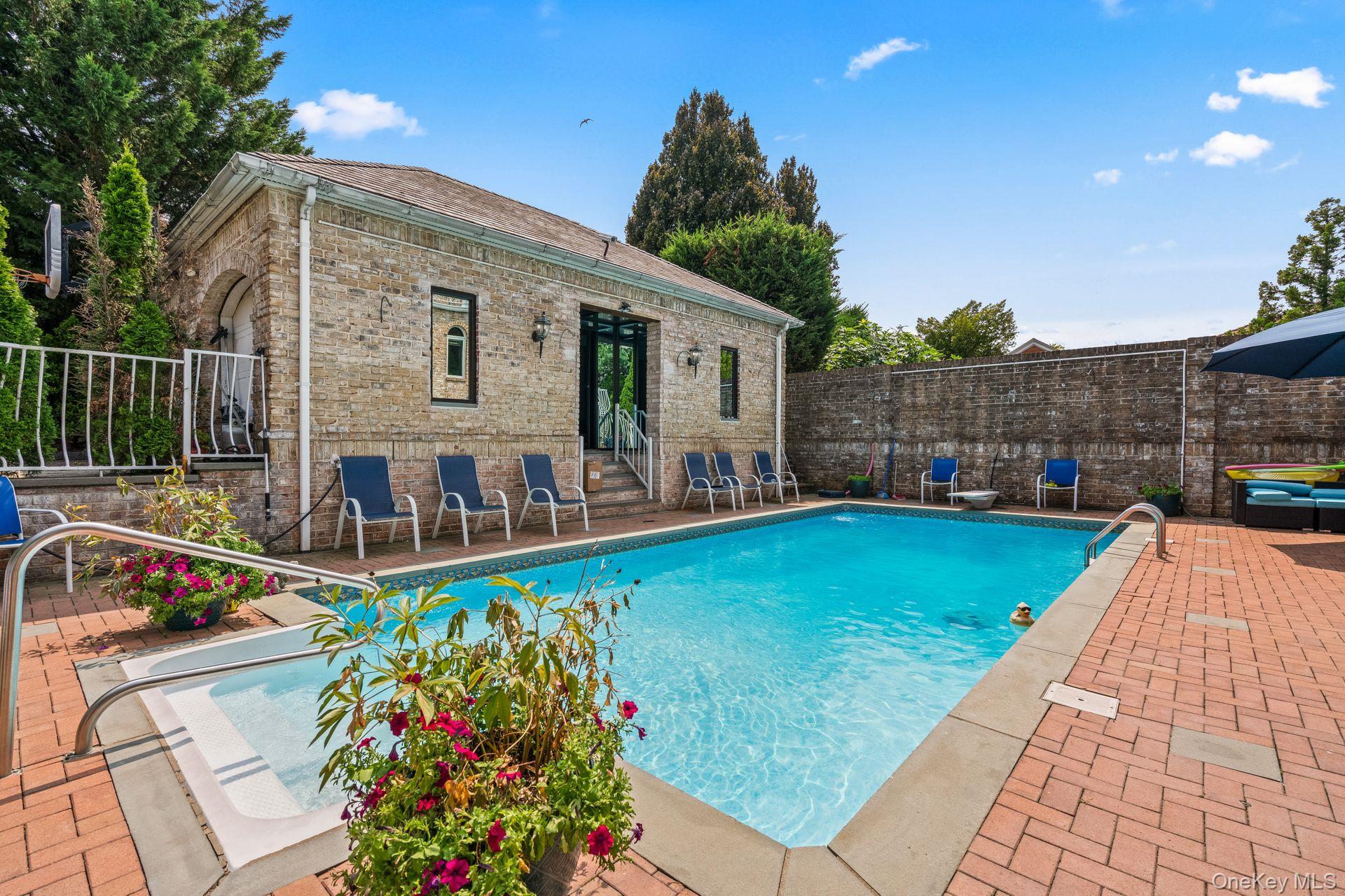 6 Summit Place Queens, NY 11357 - Photo 29 of 35 a view of a swimming pool with a patio