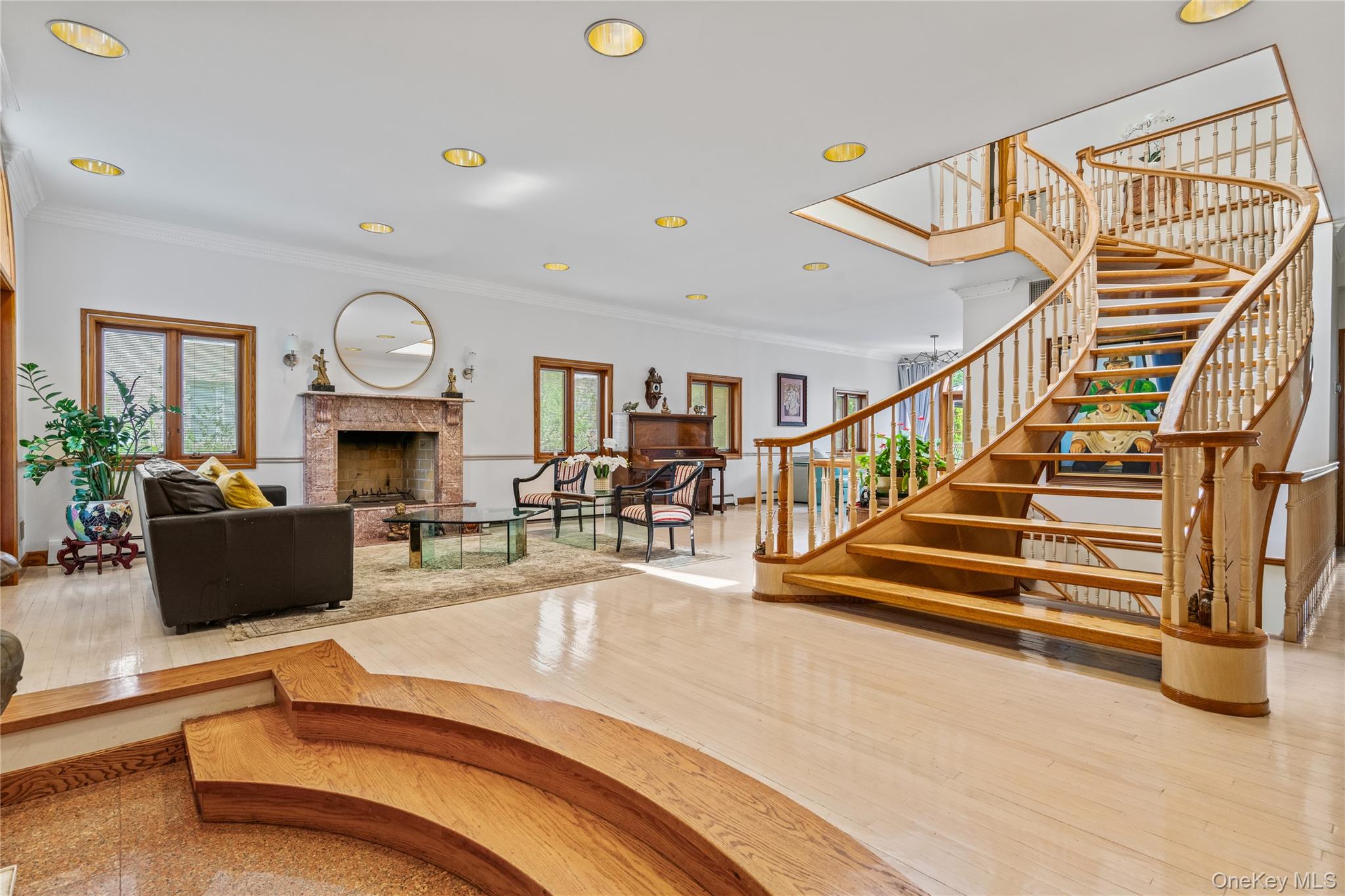 6 Summit Place Queens, NY 11357 - Photo 3 of 35 Common area featuring ornamental molding, recessed lighting, and stairway