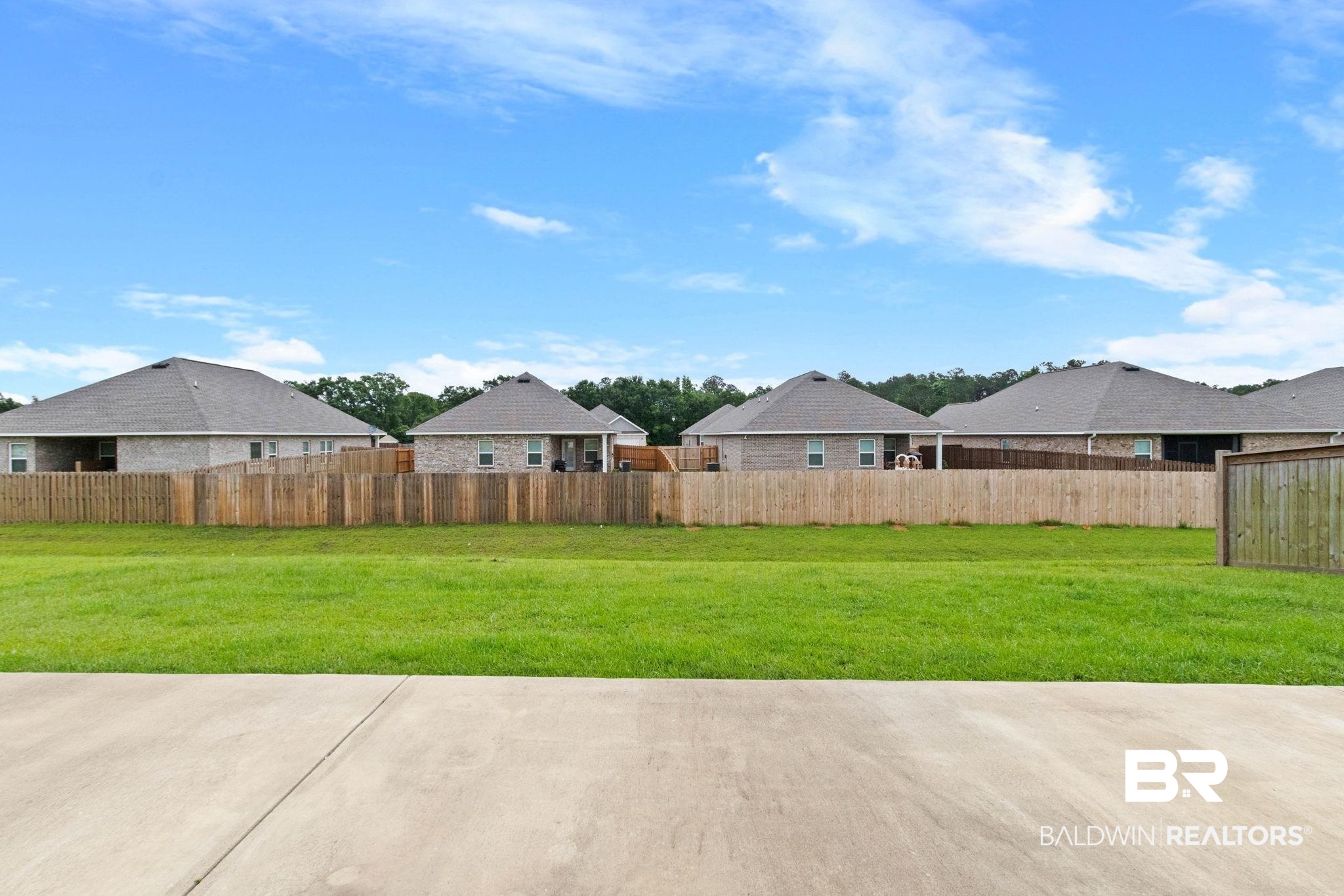 1710 Grouse Street Foley, AL 36535 - Photo 68 of 76 Expansive green space featuring a concrete pad