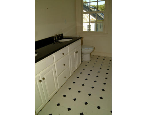 56 Wareland Road Wellesley, MA 02481 - Photo 11 of 11 a bathroom with a sink a toilet and a window