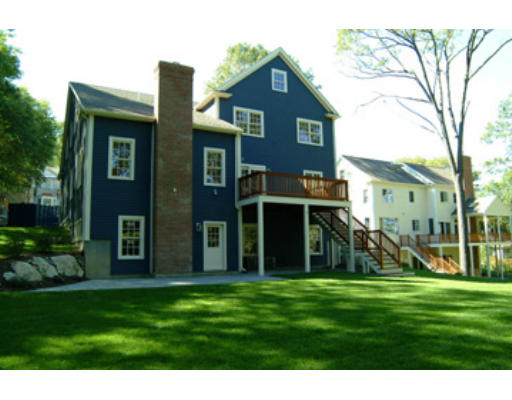 56 Wareland Road Wellesley, MA 02481 - Photo 2 of 11 a view of a house with a big yard and large trees