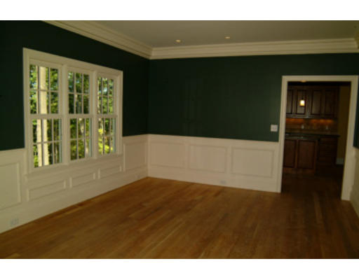 56 Wareland Road Wellesley, MA 02481 - Photo 4 of 11 a view of an empty room with wooden floor and a window