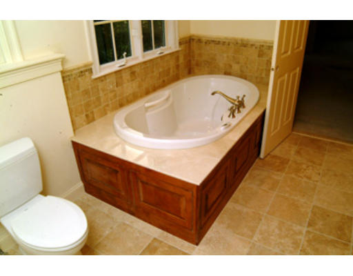 56 Wareland Road Wellesley, MA 02481 - Photo 10 of 11 a bathroom with a tub sink and toilet