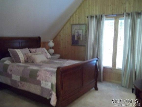 782 Front Ridge Circle Rutherfordton, NC 28139 - Photo 8 of 24 a bed sitting in a bedroom next to a window