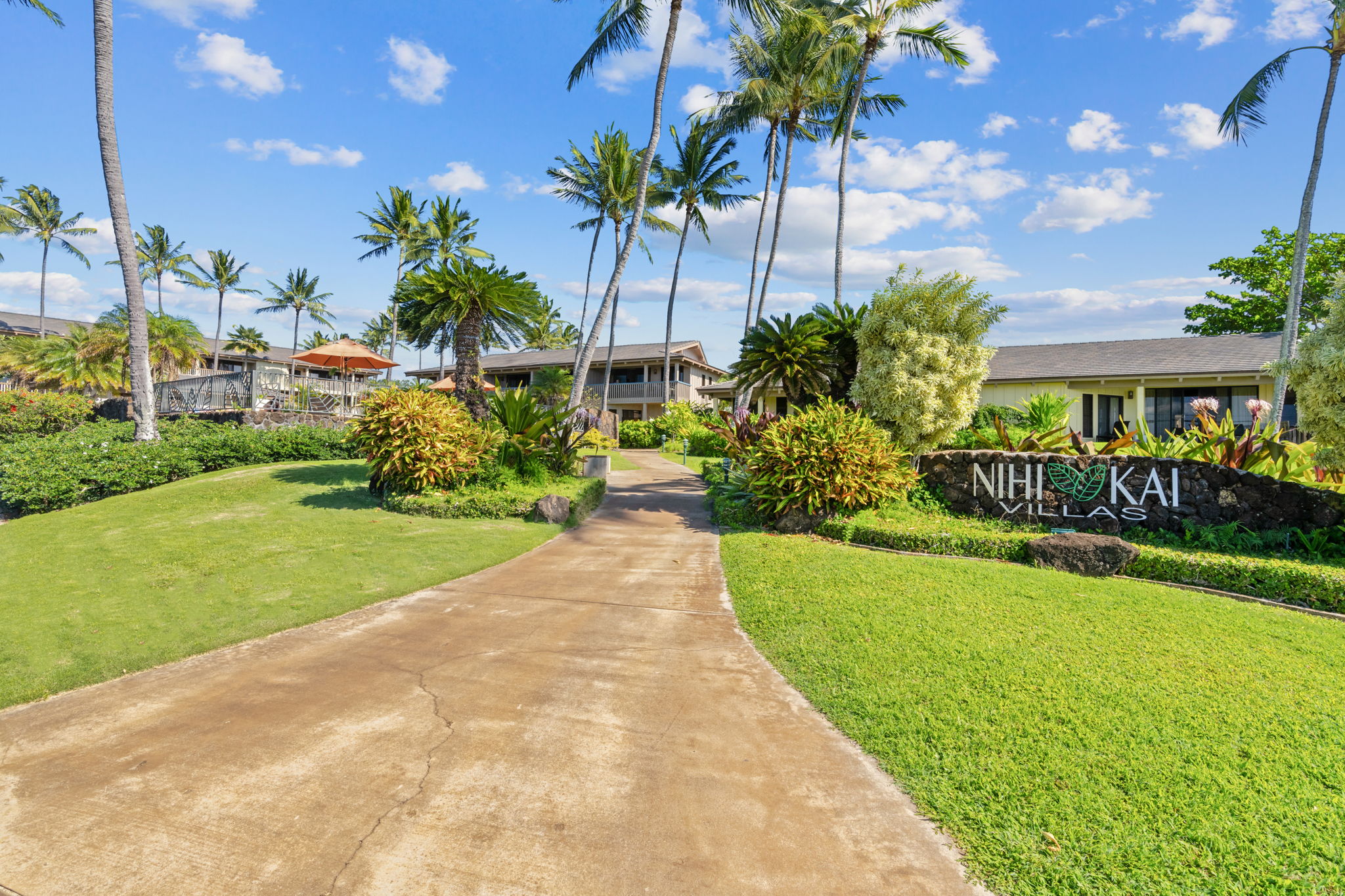1870 Hoone Road, Unit 511 Koloa, HI 96756 - Photo 26 of 30 a view of house with outdoor space and swimming pool