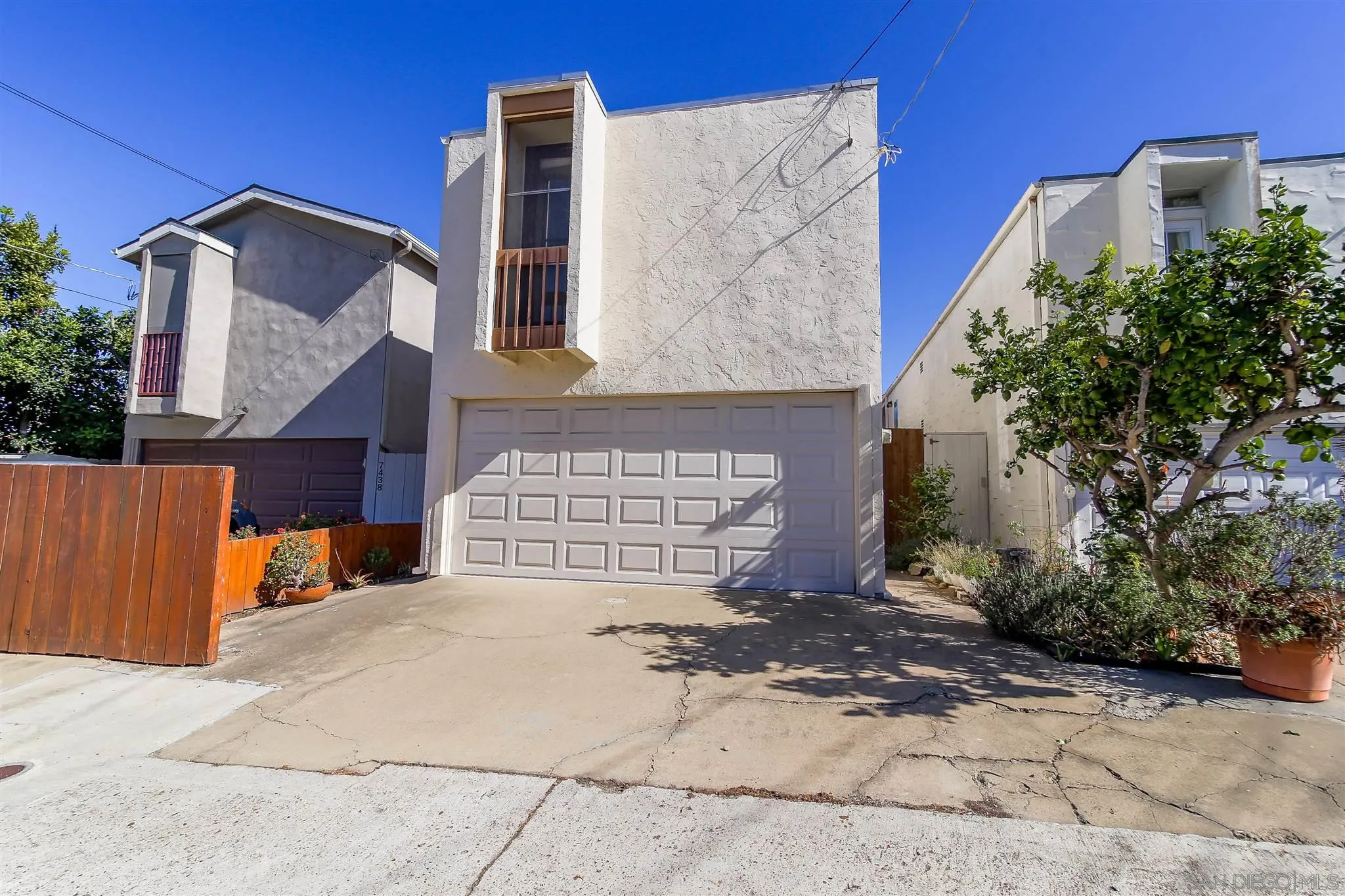 7434 High Avenue La Jolla, CA 92037 - Photo 15 of 15 a front view of a house with a garage
