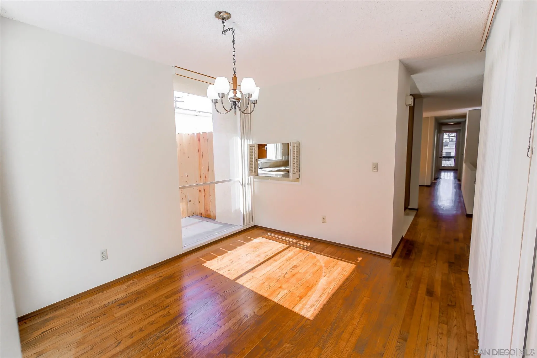 7434 High Avenue La Jolla, CA 92037 - Photo 4 of 15 a view of empty room with wooden floor