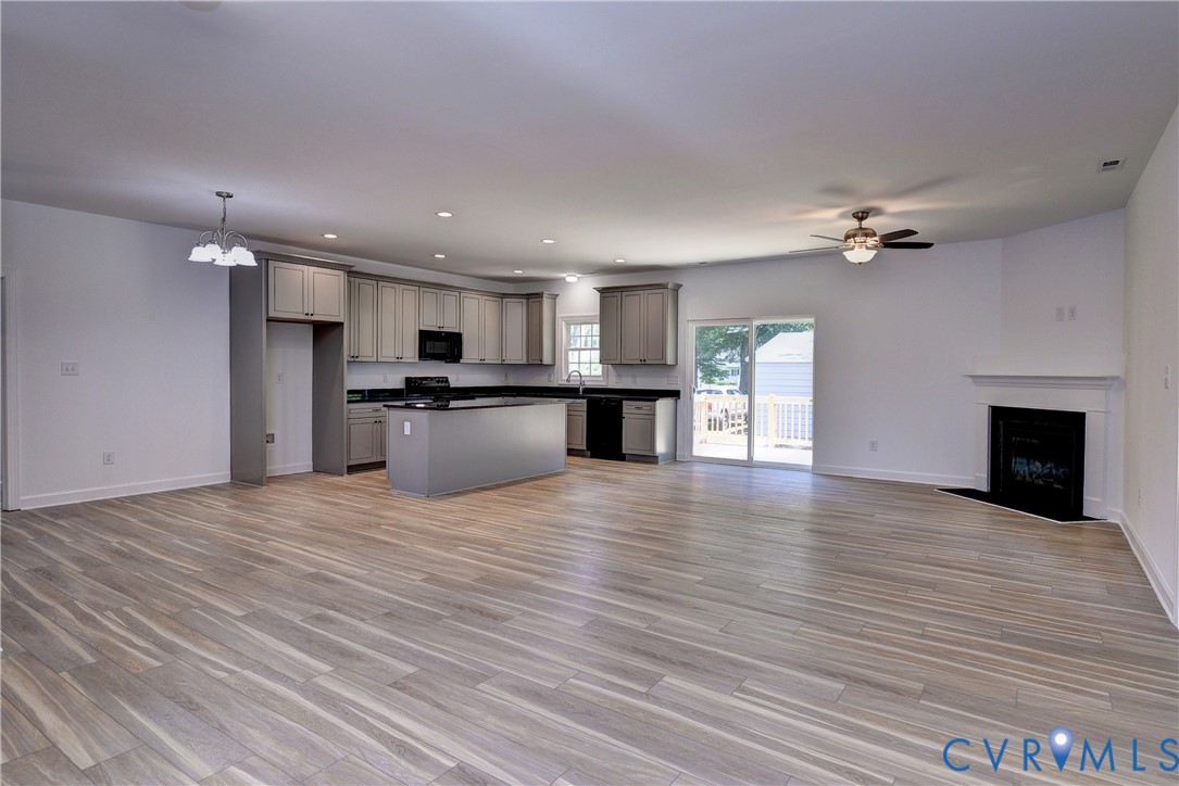 321 Pointers Drive West Point, VA 23181 - Photo 7 of 29 open concept family room, dining area and kitchen