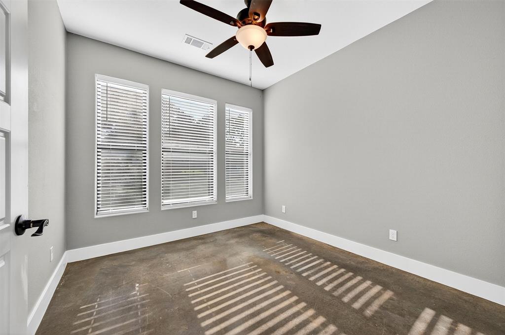 1501 South 7th Avenue Denison, TX 75021 - Photo 18 of 32 a view of an empty room with a window