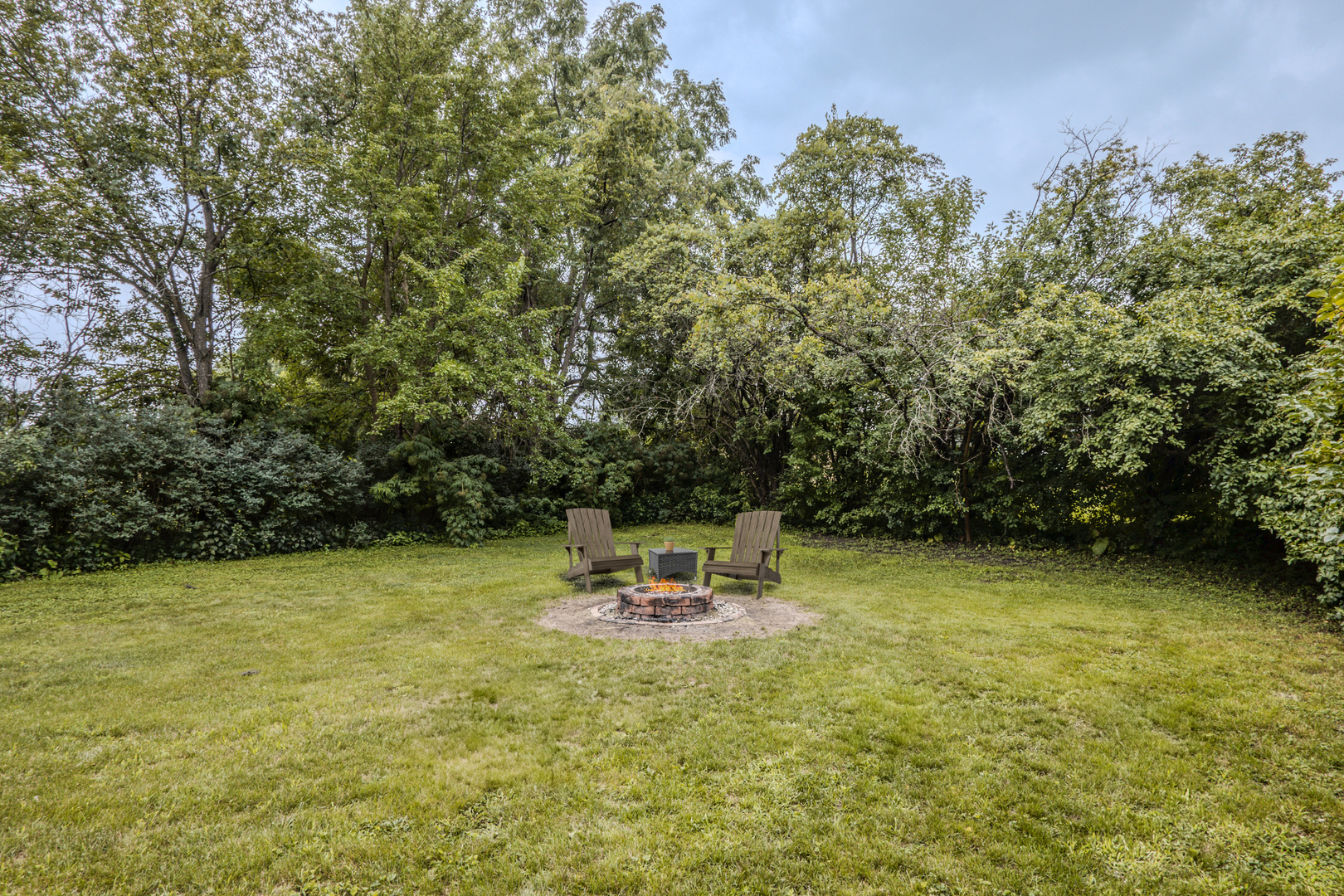 1936 South Street Geneva, IL 60134 - Photo 32 of 34 a backyard of a house with table and chairs