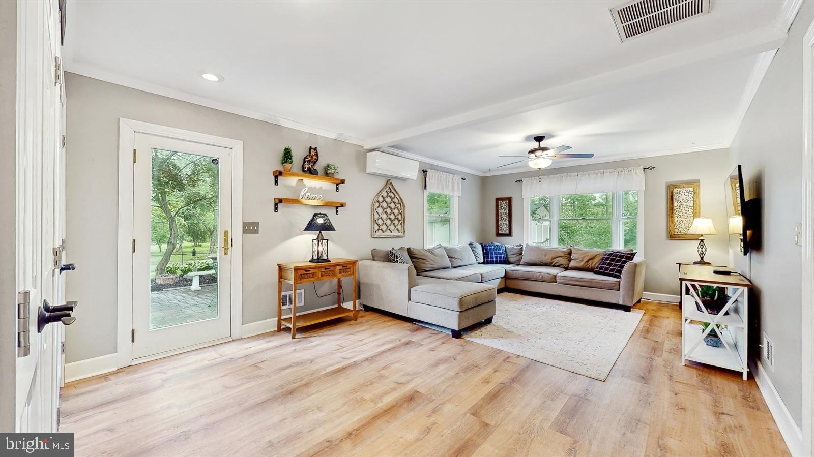 6 John Ringo Road Ringoes, NJ 08551 - Photo 13 of 27 a living room with furniture and a wooden floor
