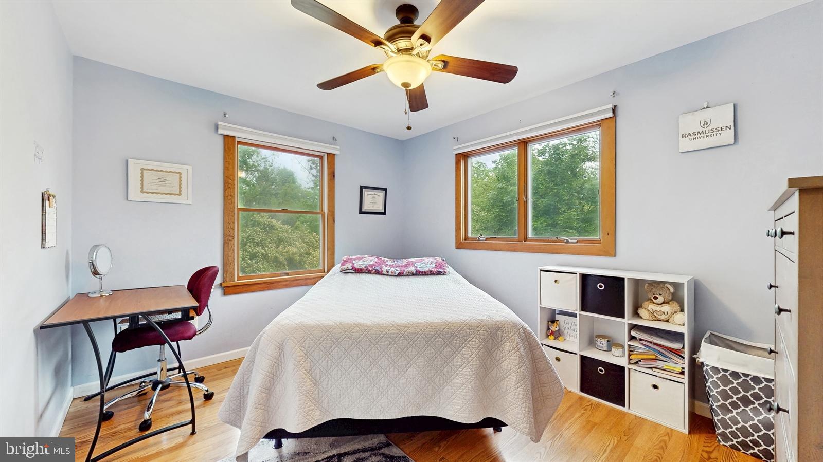 6 John Ringo Road Ringoes, NJ 08551 - Photo 15 of 27 a bedroom with a bed and a chandelier