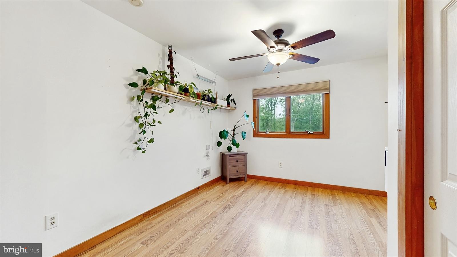 6 John Ringo Road Ringoes, NJ 08551 - Photo 17 of 27 wooden floor in an empty room with a window