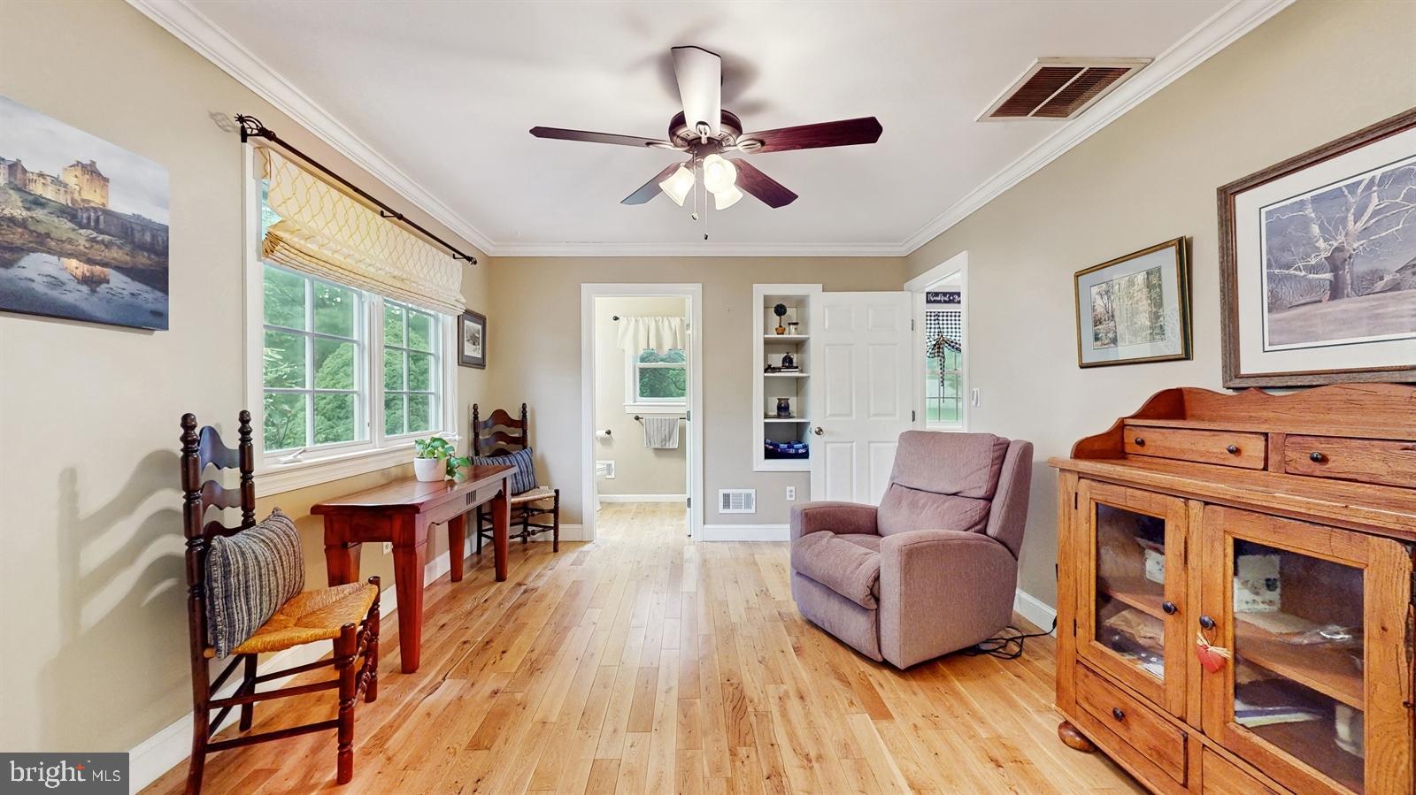 6 John Ringo Road Ringoes, NJ 08551 - Photo 2 of 27 a living room with furniture a wooden floor and a window