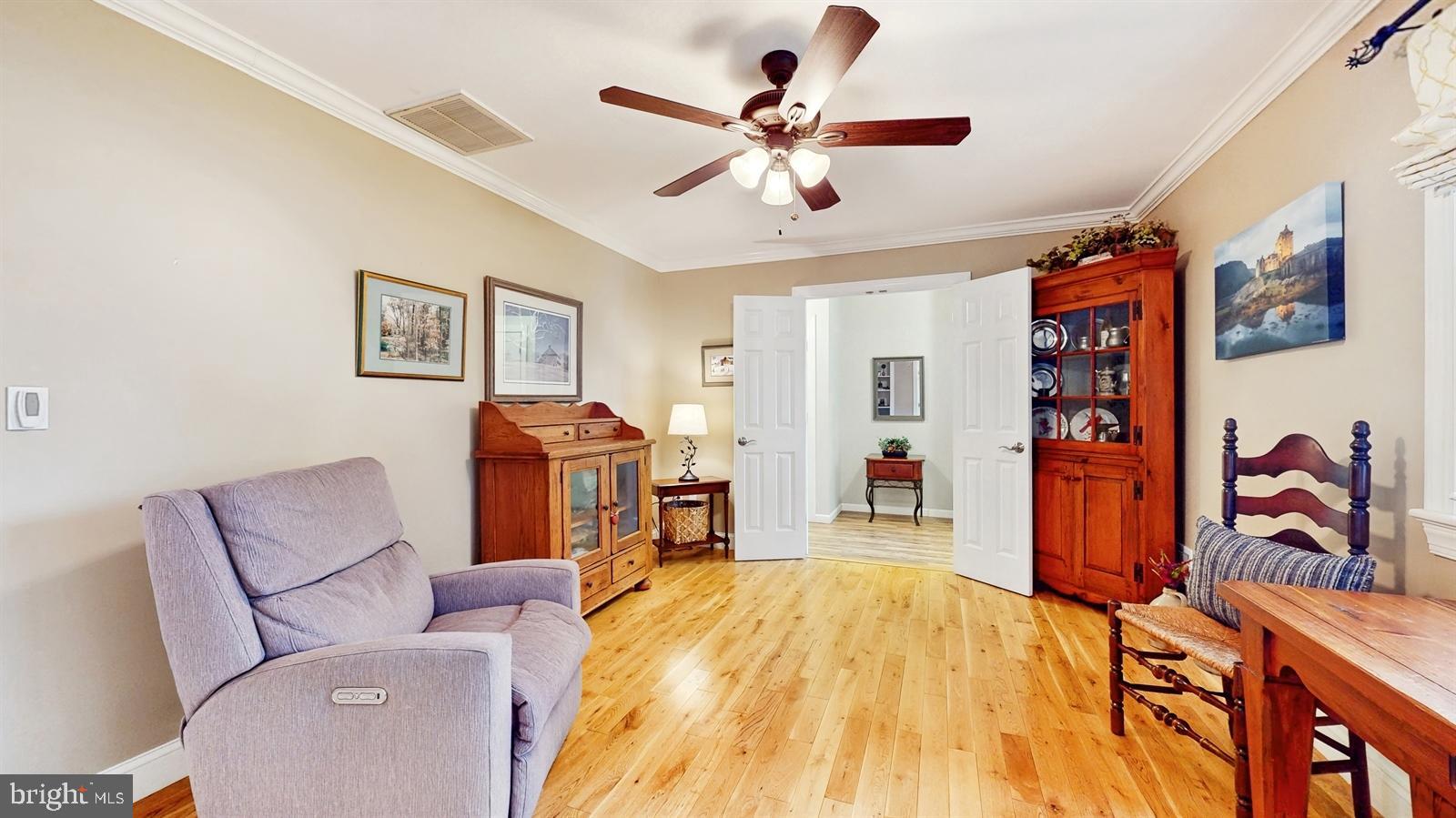6 John Ringo Road Ringoes, NJ 08551 - Photo 3 of 27 a bed room with a bed and a chandelier