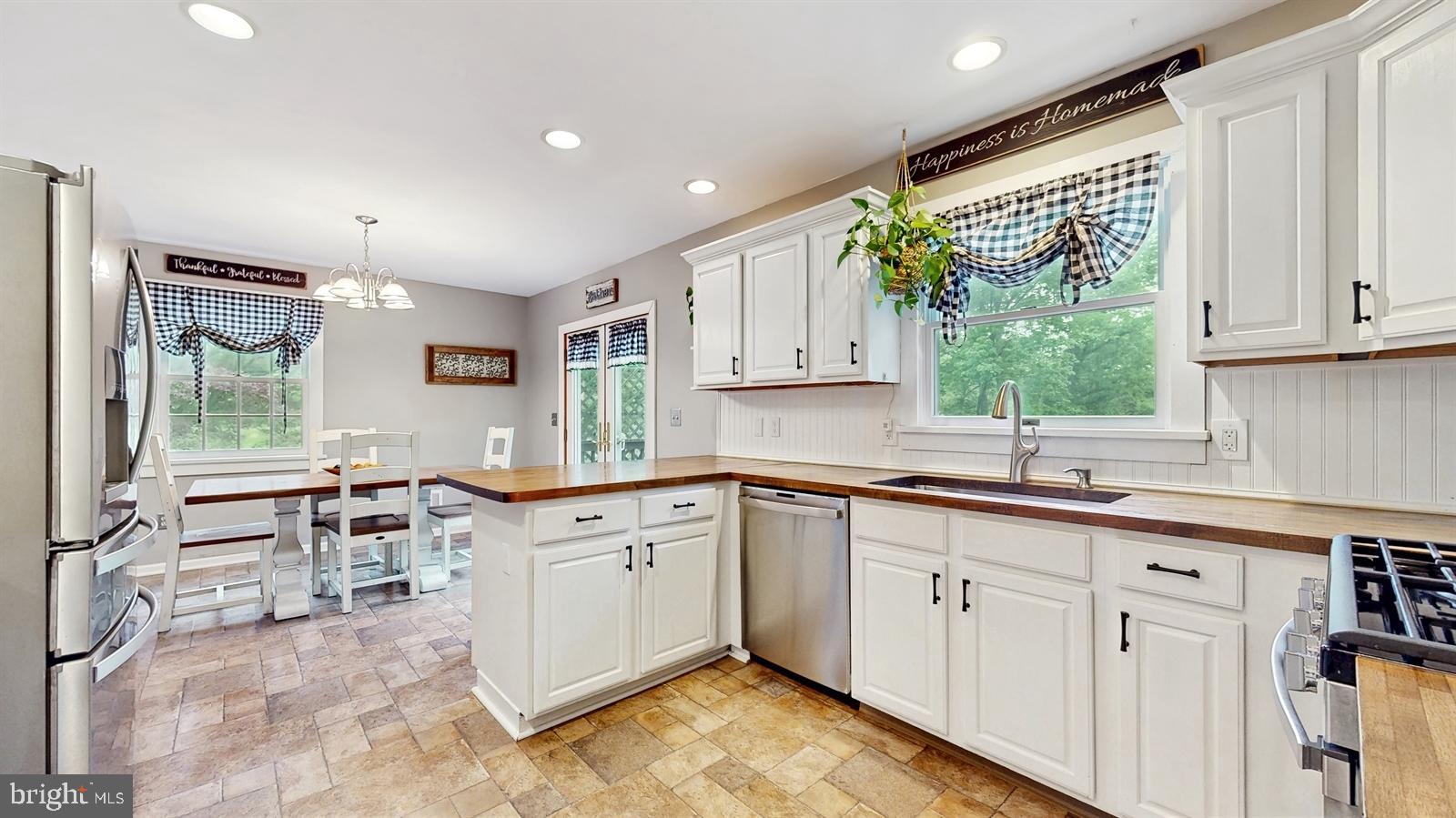6 John Ringo Road Ringoes, NJ 08551 - Photo 6 of 27 a kitchen with sink cabinets and wooden floor