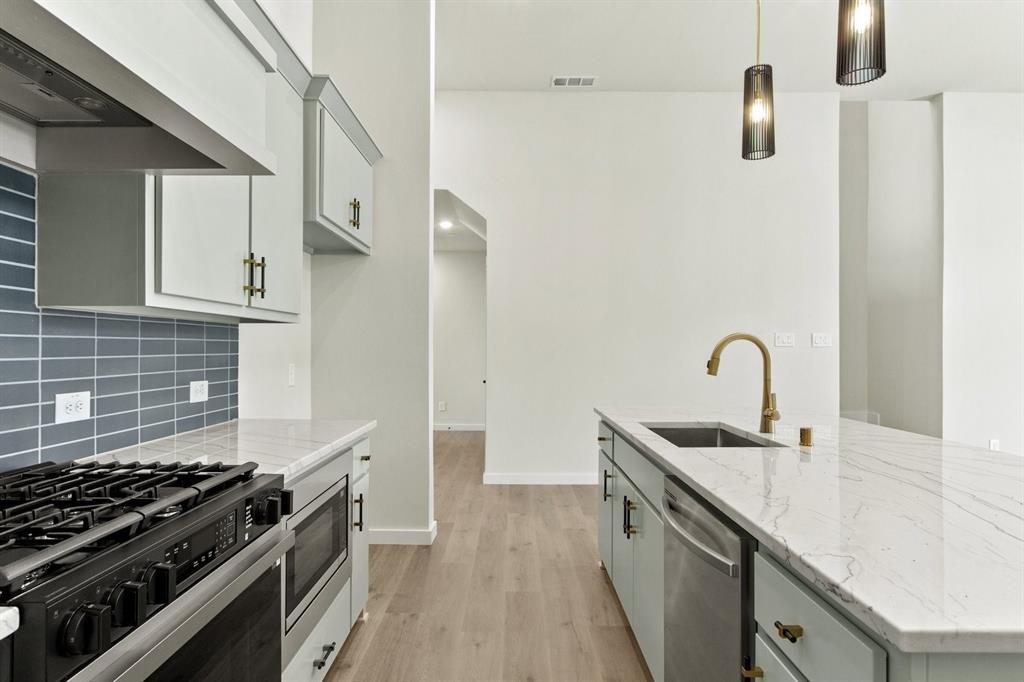 8509 Del Rio Trail Wylie, TX 75098 - Photo 6 of 25 013-8509DelRioTrail-Rowlett-TX-75089-Kitchen.jpg-SMALL