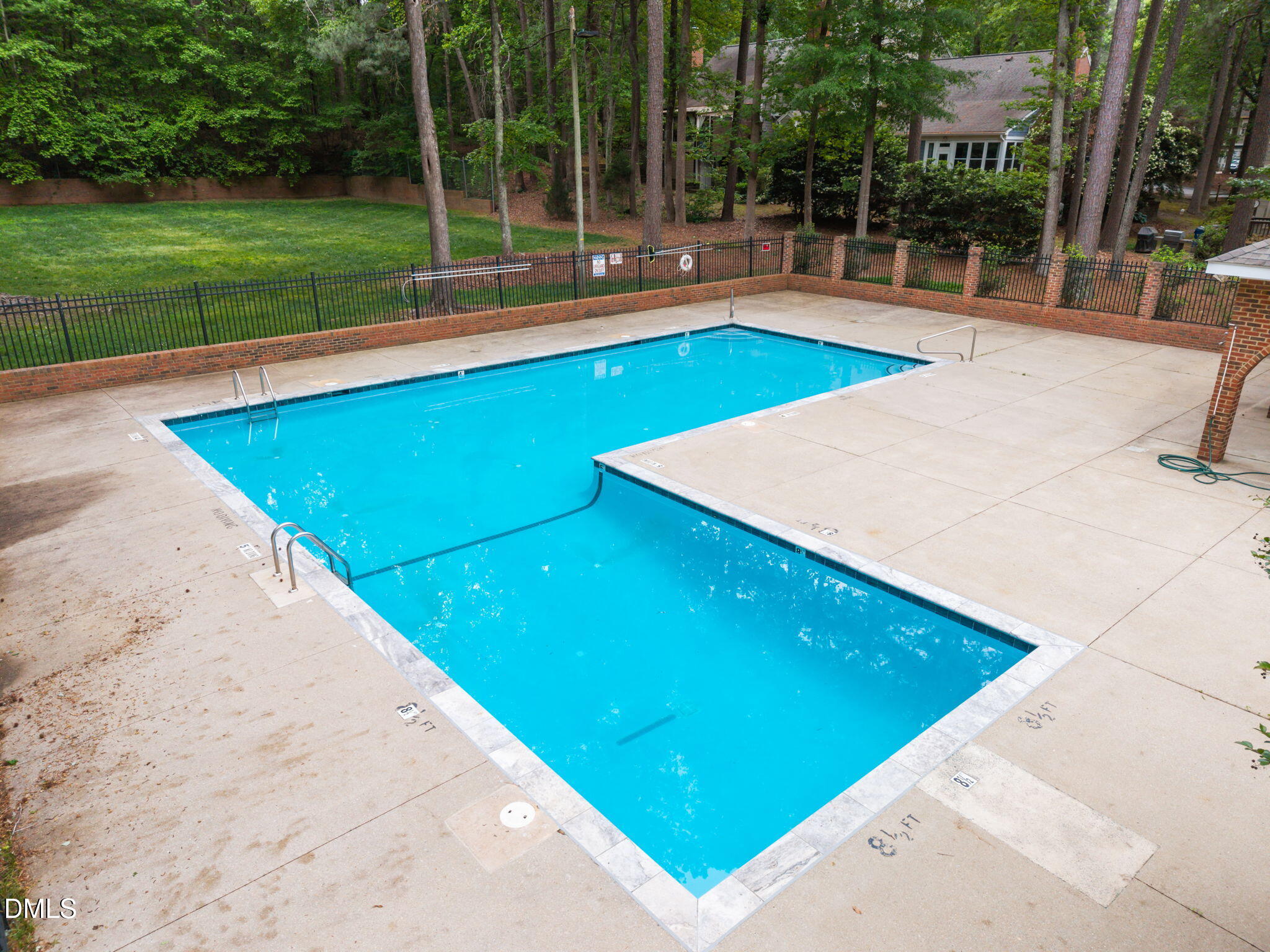 562 Weathergreen Drive Raleigh, NC 27615 - Photo 47 of 47 a view of a tennis ground with large trees