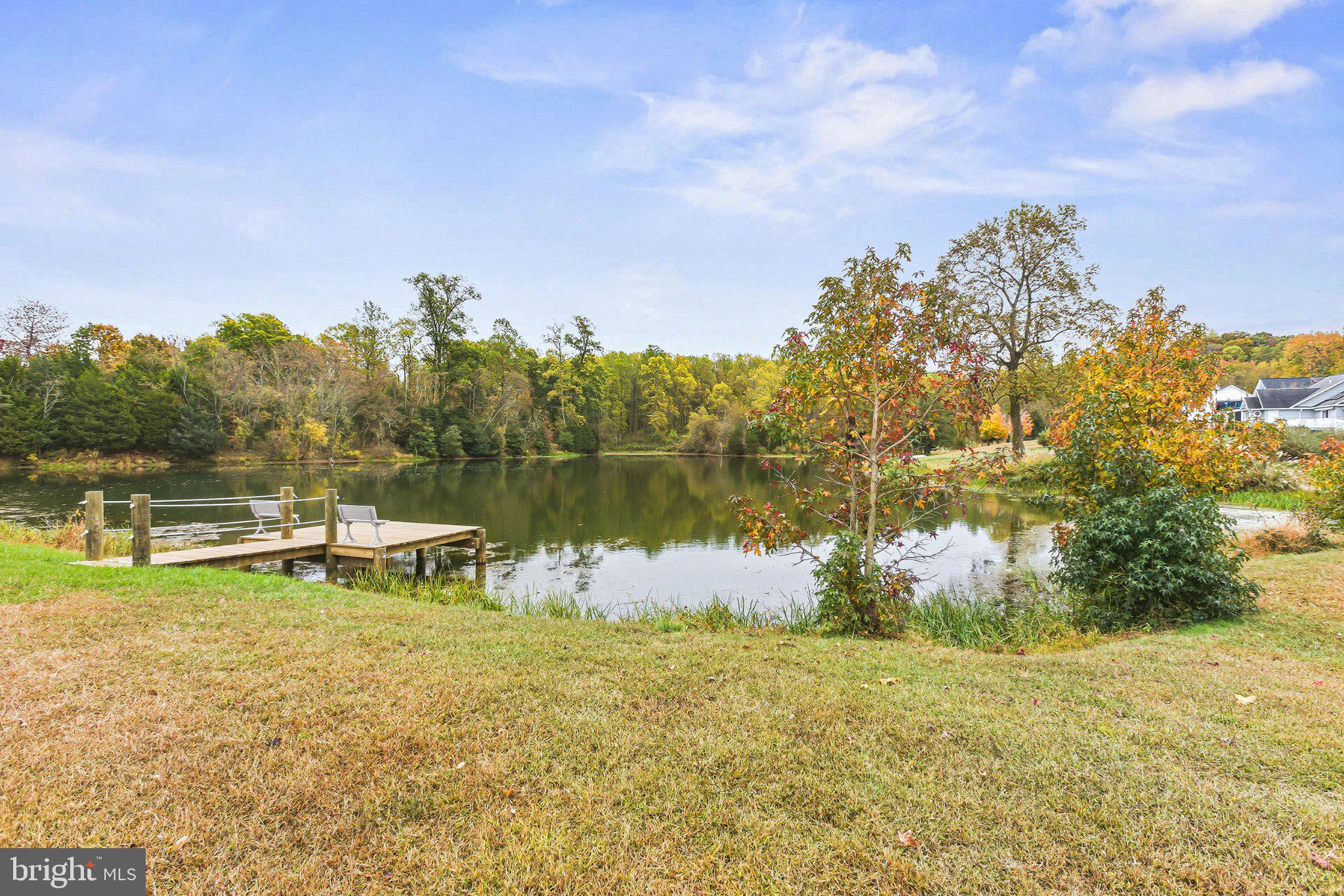 6495 Tides Road King George, VA 22485 - Photo 58 of 65 a view of a lake with a nearby beach