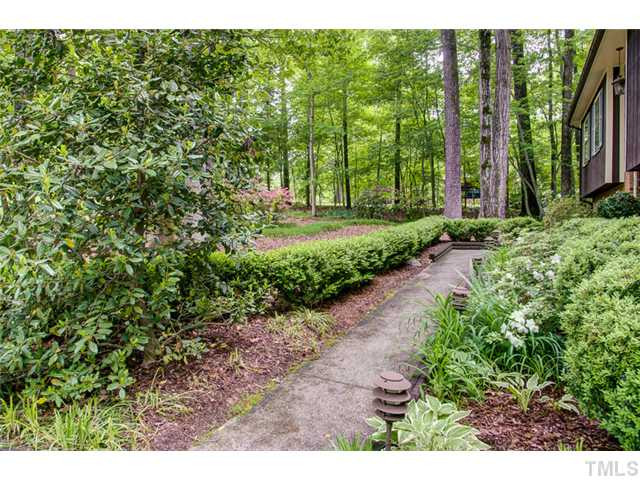 5822 Scalybark Road Durham, NC 27712 - Photo 4 of 25 The yard is nicely landscaped and has been professionally maintained for years. Exterior Front