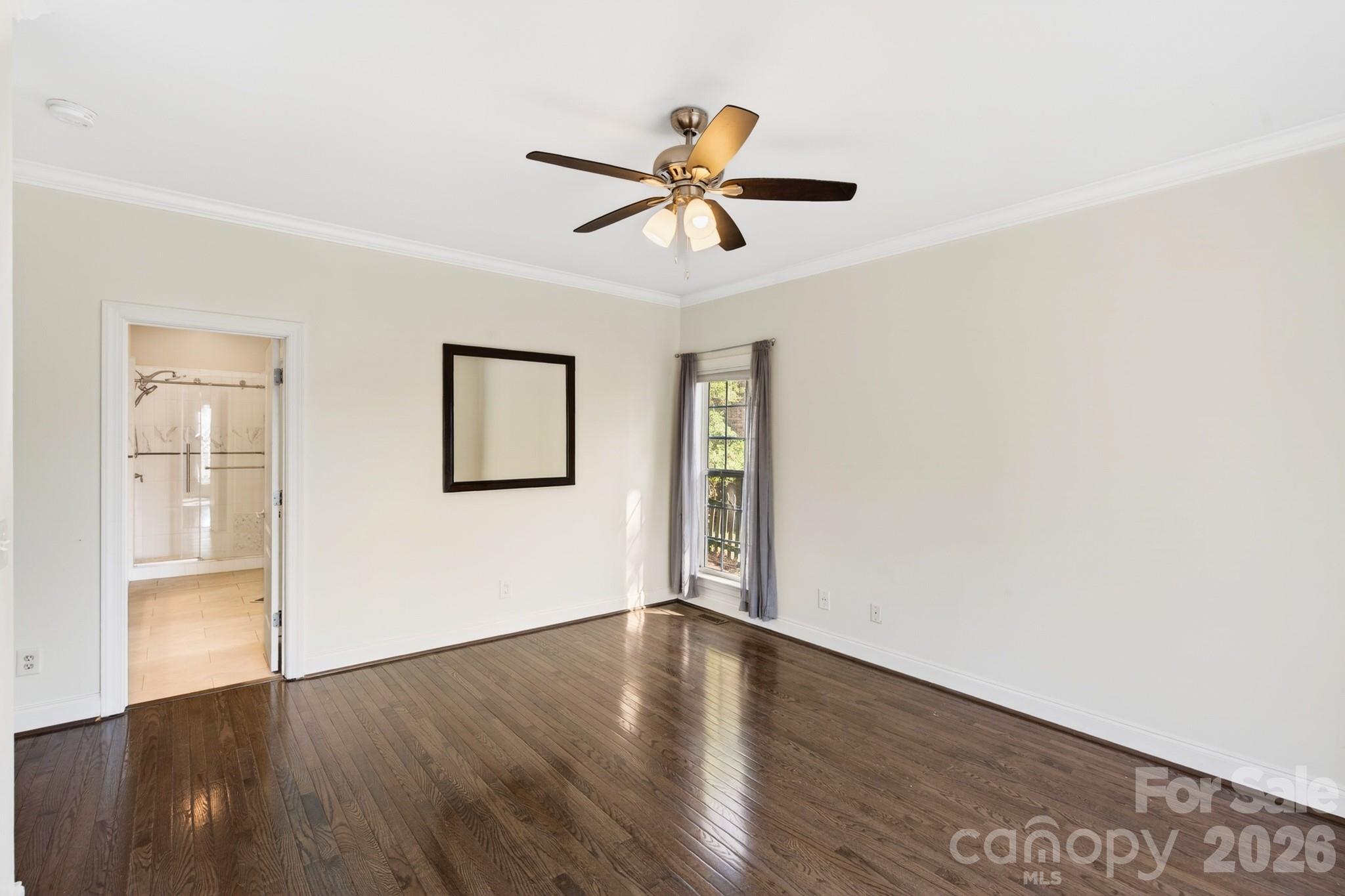 9101 Pitcairn Drive Tega Cay, SC 29708 - Photo 22 of 48 a view of empty room with wooden floor
