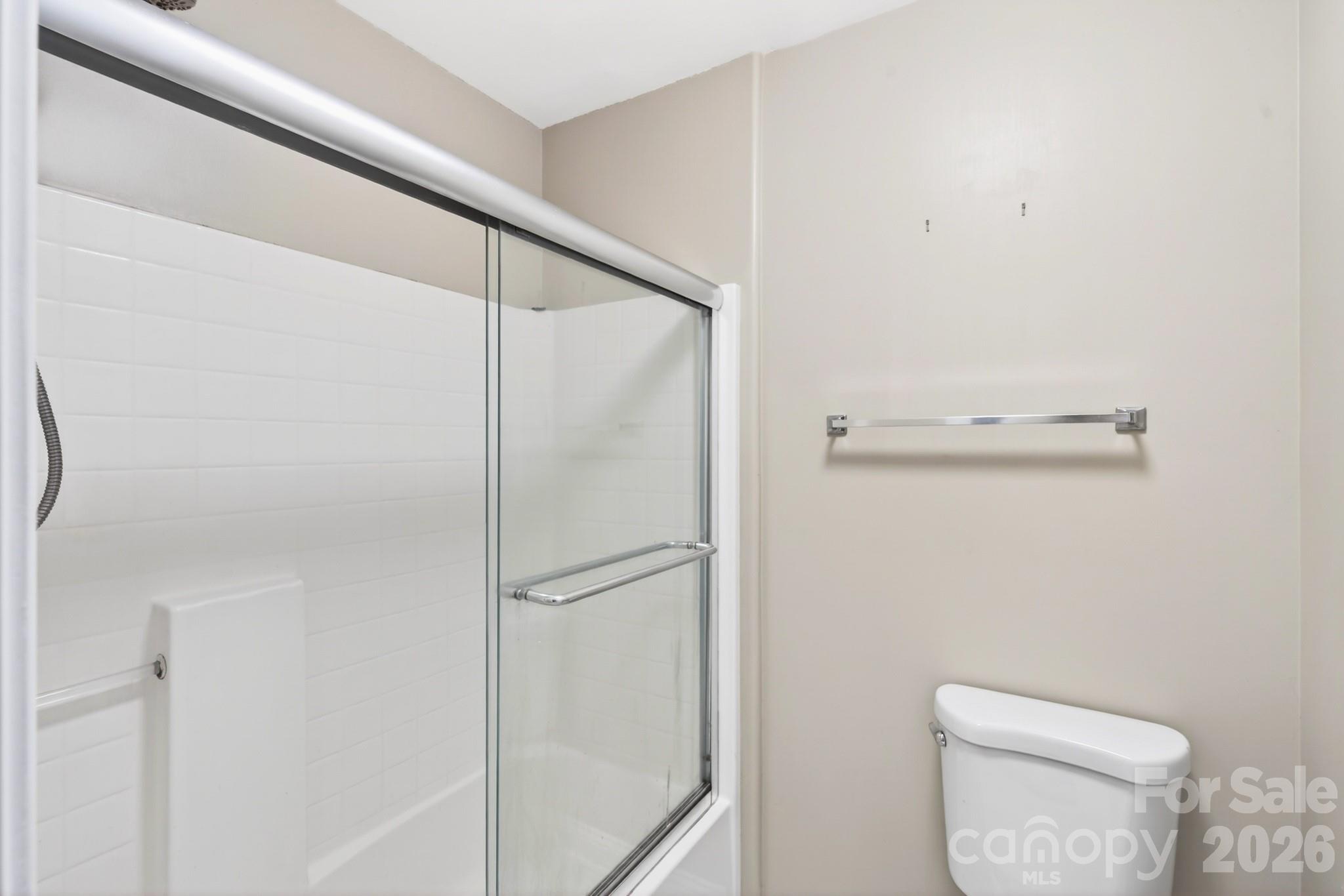 9101 Pitcairn Drive Tega Cay, SC 29708 - Photo 30 of 48 a bathroom with a shower and toilet