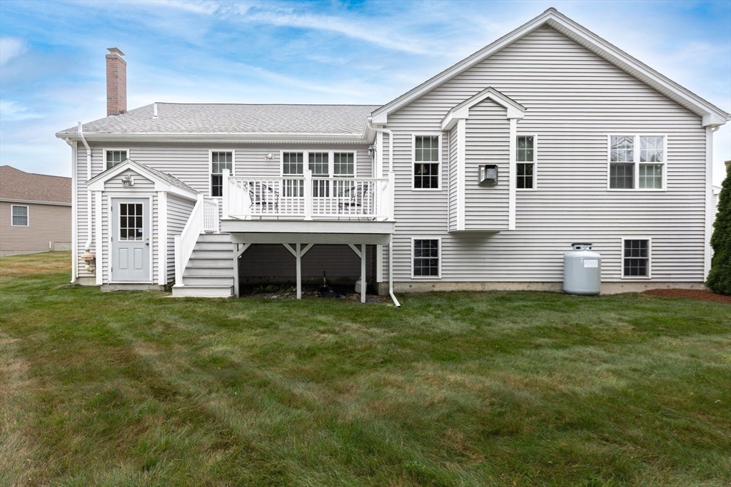 11 Deirdre Circle, Unit 11 Rehoboth, MA 02769 - Photo 13 of 17 a front view of house with yard and green space