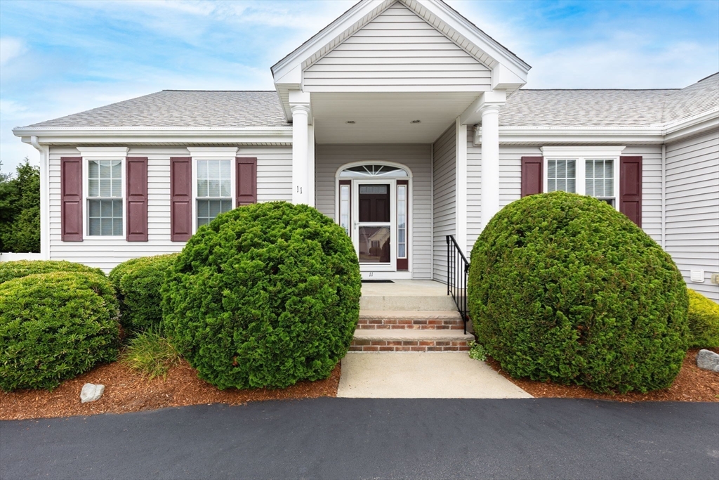 11 Deirdre Circle, Unit 11 Rehoboth, MA 02769 - Photo 16 of 17 front view of a house with a yard
