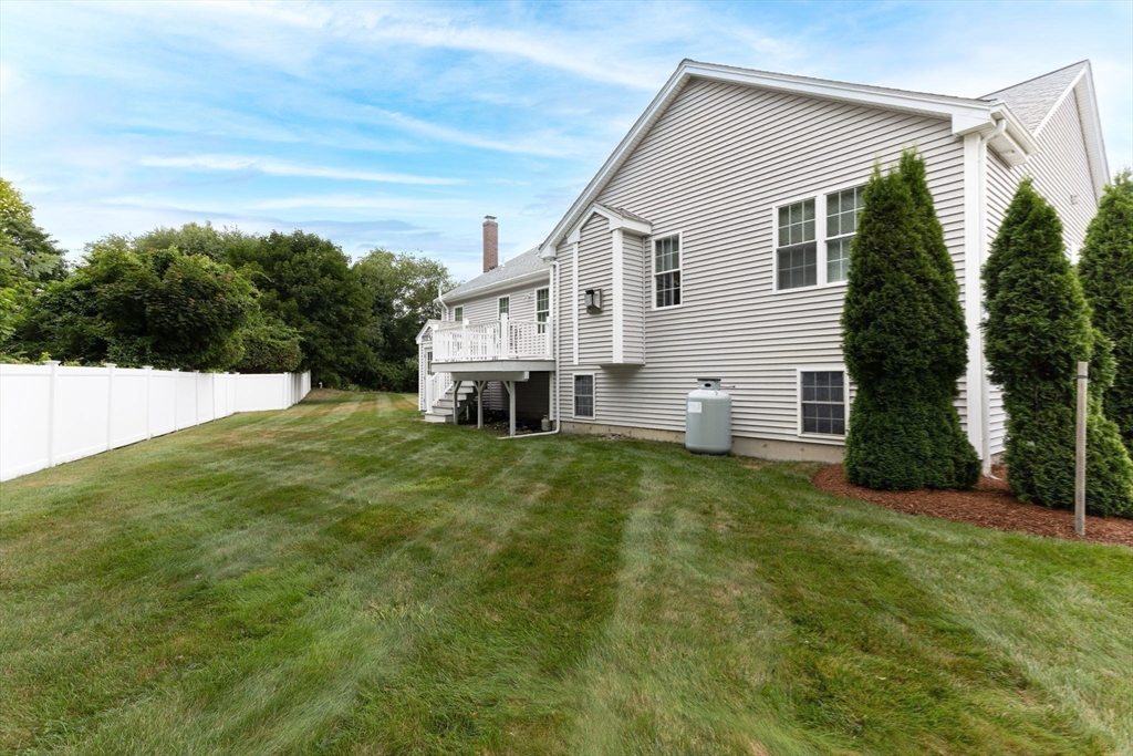 11 Deirdre Circle, Unit 11 Rehoboth, MA 02769 - Photo 10 of 17 a view of a house with a backyard