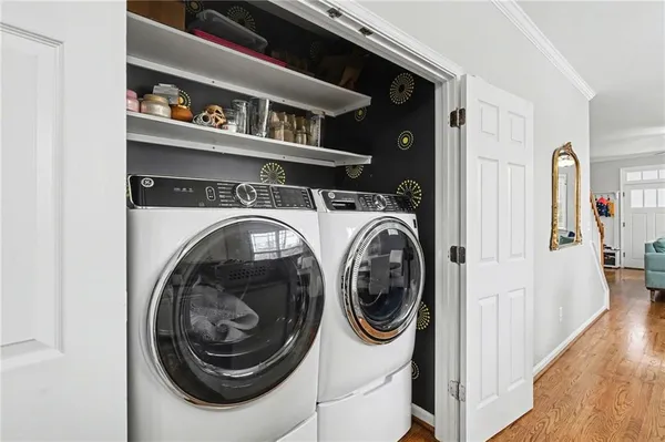a utility room with dryer and washer